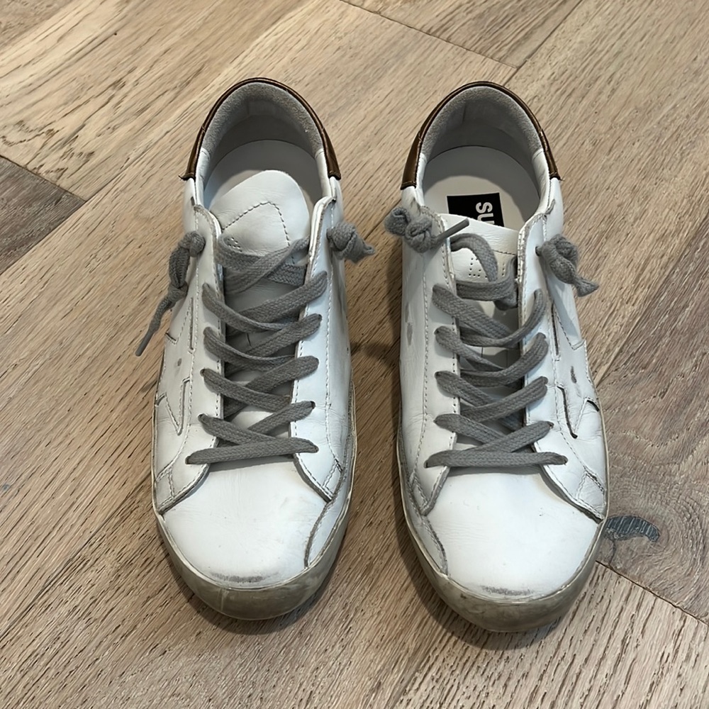 White leather with bronze accent golden goose sneakers